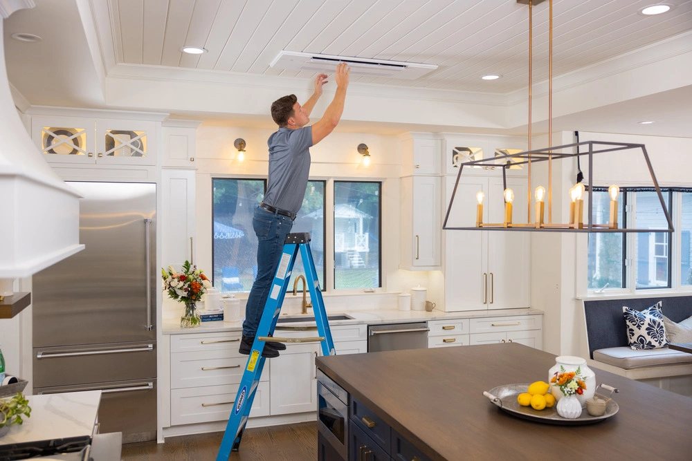 Ductless mini-split ceiling cassette installed in a kitchen